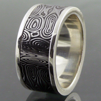 Handgefertigter Damastring in 935er Silber eingefasst